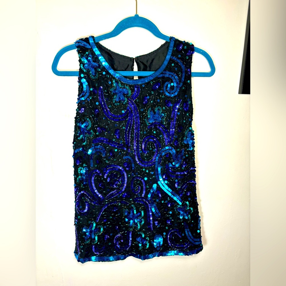 Beautifully beaded sleeveless shirt